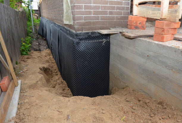 Happy homeowners after waterproofing job in Piedmont